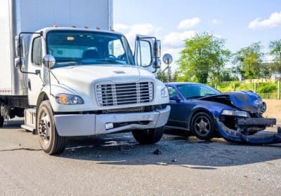 Truck accident lawyer in Georgia discussing a case with a client."