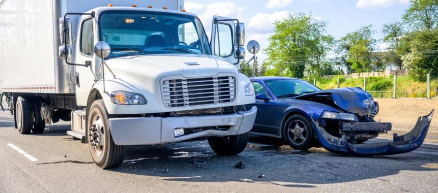 Truck accident lawyer in Georgia discussing a case with a client."